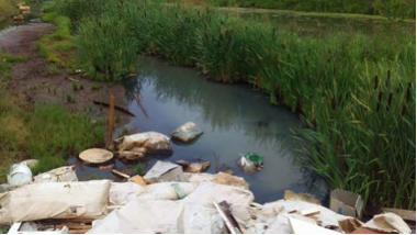 Pollution of Volosyanikha channel in a suburb of Dzerzhinsk
