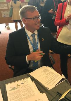 Ado Lõhmus, Deputy Secretary General, Ministry of Environment (Estonia) signing a consent form for hair testing at the IPEN booth